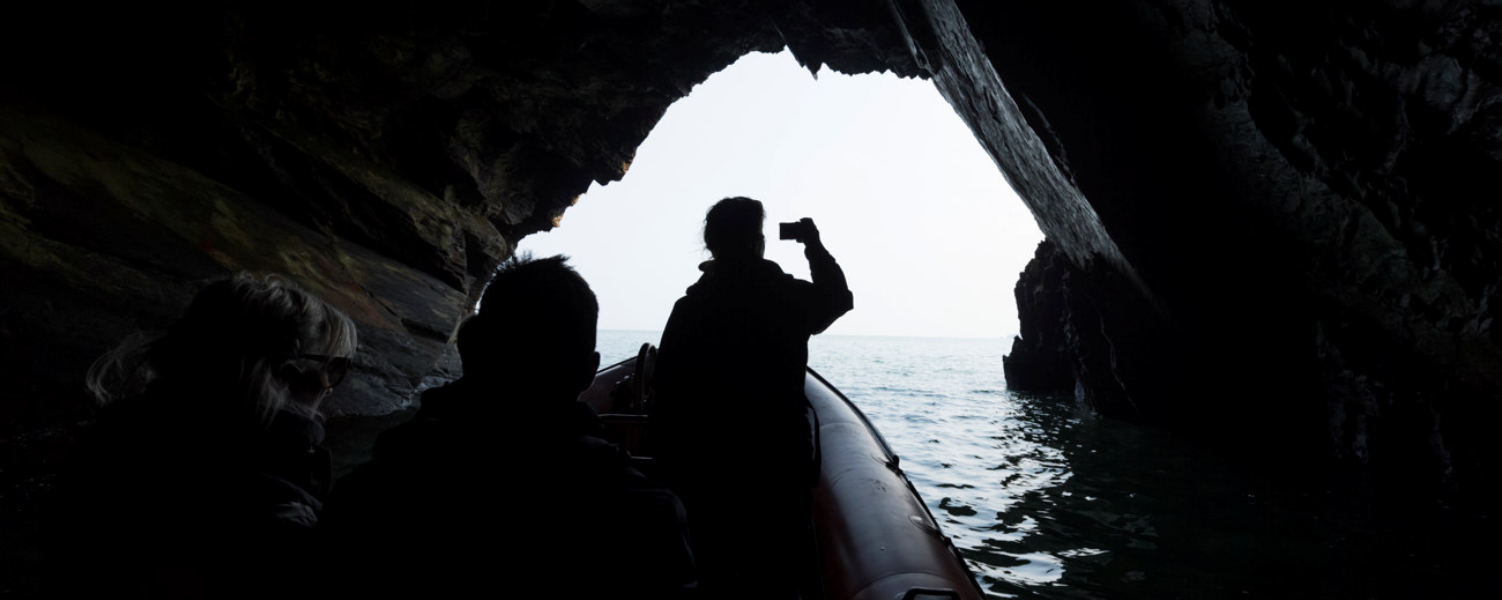 boats go inside the sea caves